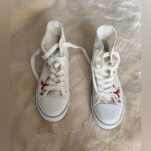 Women’s size 7 Kufeiti high top canvas sneakers. NWOT.